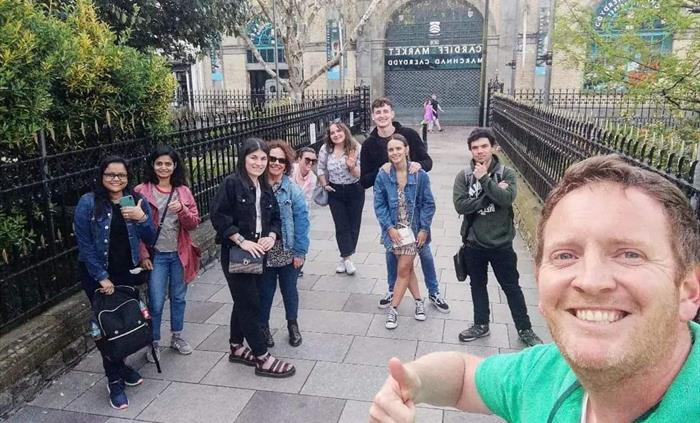 Cardiff Dark Side Tour outside Cardiff Market and St. John the Baptist Church in central Cardiff.
